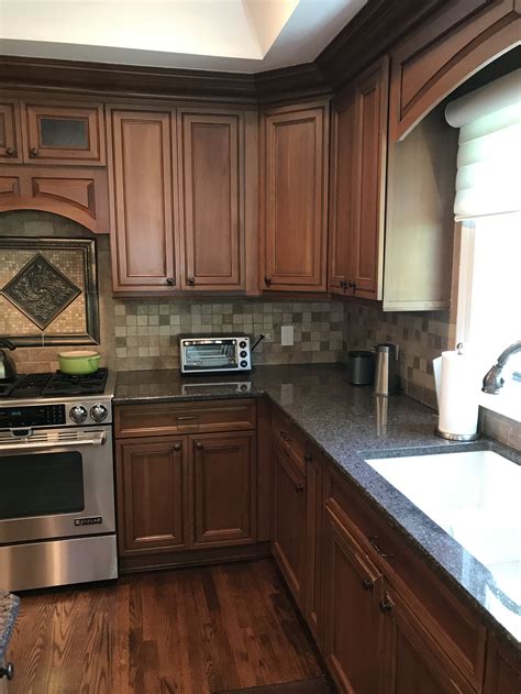 brown kitchen cabinets with stainless steel appliances|stainless steel cabinet color schemes.